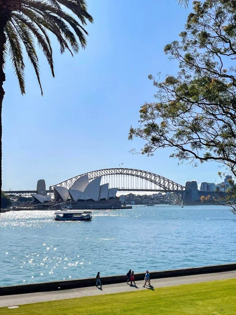 People walking beside Sydney waterfront
