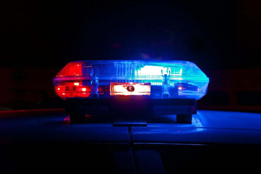 Close-up of flashing police emergency lights; illustrative photograph not taken in Brighton-Le-Sands