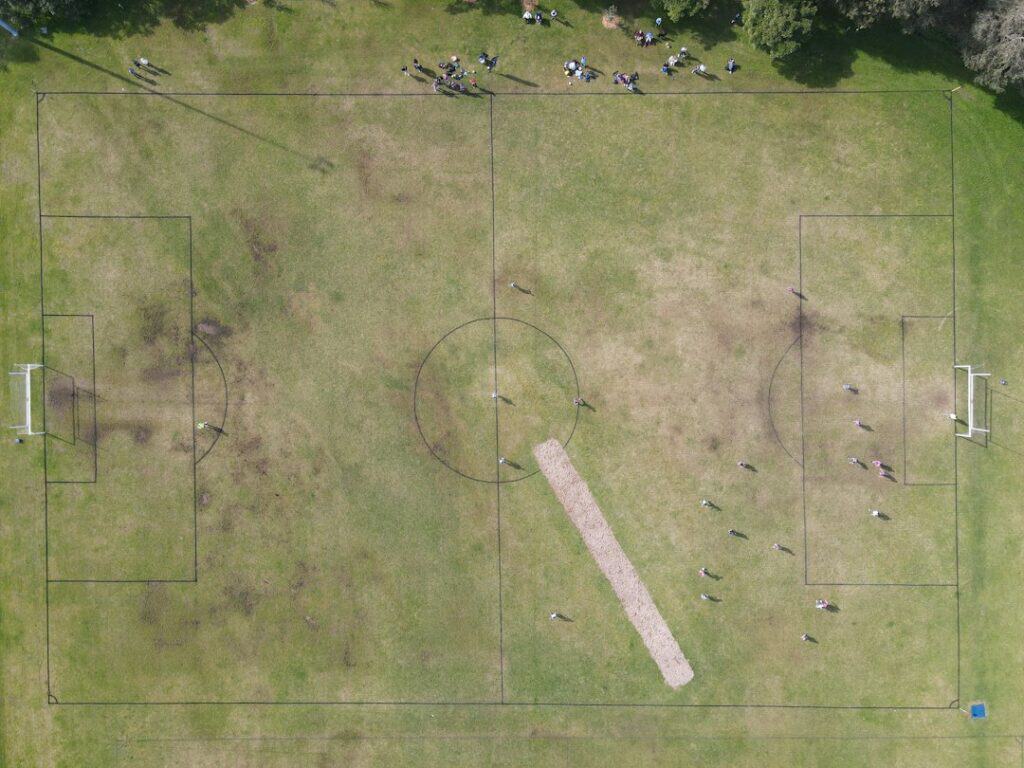 Aerial view of a green sports field